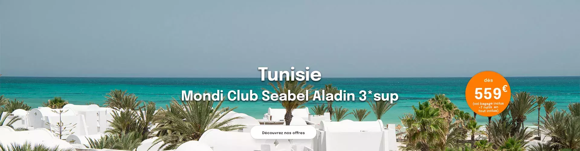 Petits bungalows blancs du Mondi Club Seabel Aladin en Tunisie avec la mer turquoise en fond, proposé dès 559€